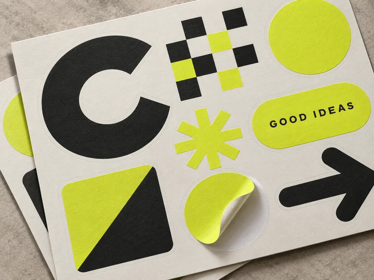 AI concept of a kiss-cut sticker sheet with one sticker partly peeled from its liner
